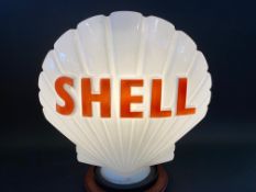 A Shell glass petrol pump globe by Webb's Crystal, dated December 1956.