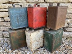 Six two gallon petrol cans.