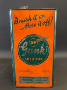 A Gunk Solution gallon can with image of an aeroplane in flight to the front.