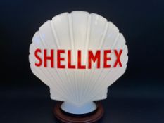 A Shellmex glass petrol pump globe in excellent condition, bright lettering, dated November 1956.