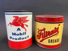 A Filtrate grease tin and a second for Mobil.