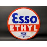 A large Esso Ethyl circular double sided enamel sign dated January 1935, some retouching to the