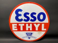 A large Esso Ethyl circular double sided enamel sign dated January 1935, some retouching to the