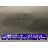 A rare and early enamel tram sign for Cambridge Road Railway Bridge, 23 x 3".