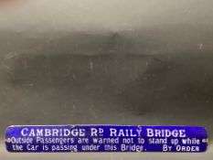 A rare and early enamel tram sign for Cambridge Road Railway Bridge, 23 x 3".