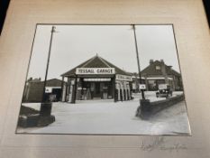 A professionally taken photograph of Tessall Garage, pencil annotation 'Kings Norton', showing a