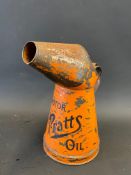 A Pratts Motor Oil quart measure with script lettering.