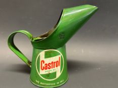 A Castrol Motor Oil half pint measure dated 1964, in excellent condition.