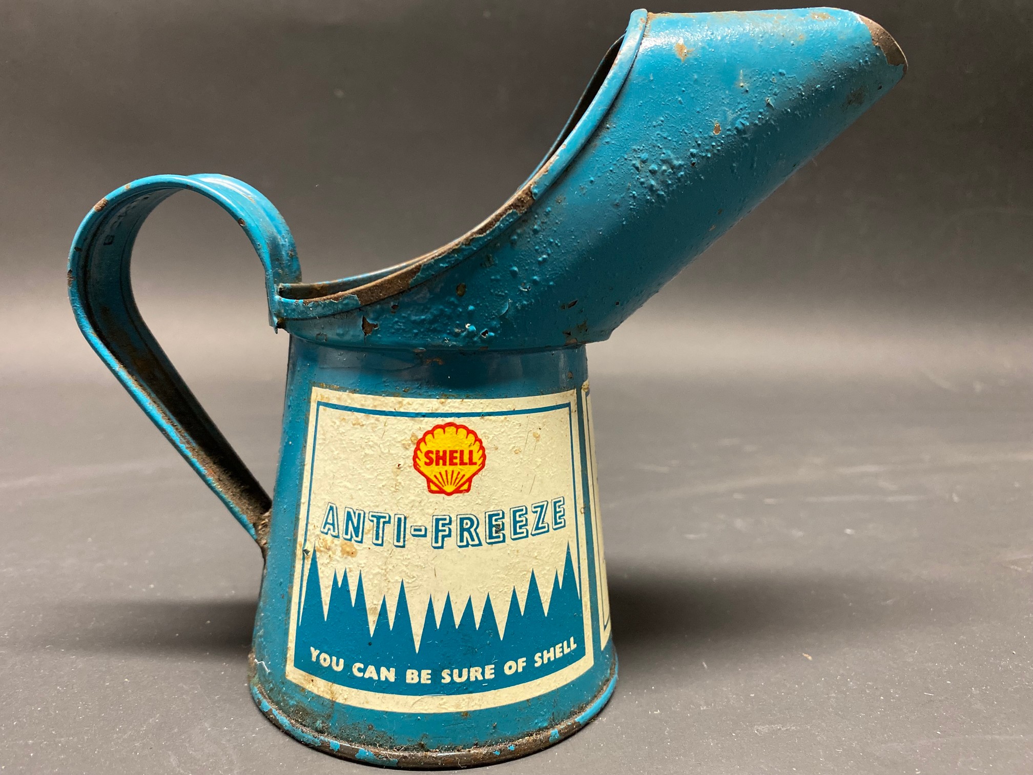 A Shell Anti-Freeze half pint measure.