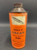 A Delco Lovejoy Shock Absorber Oil cylindrical quart can.