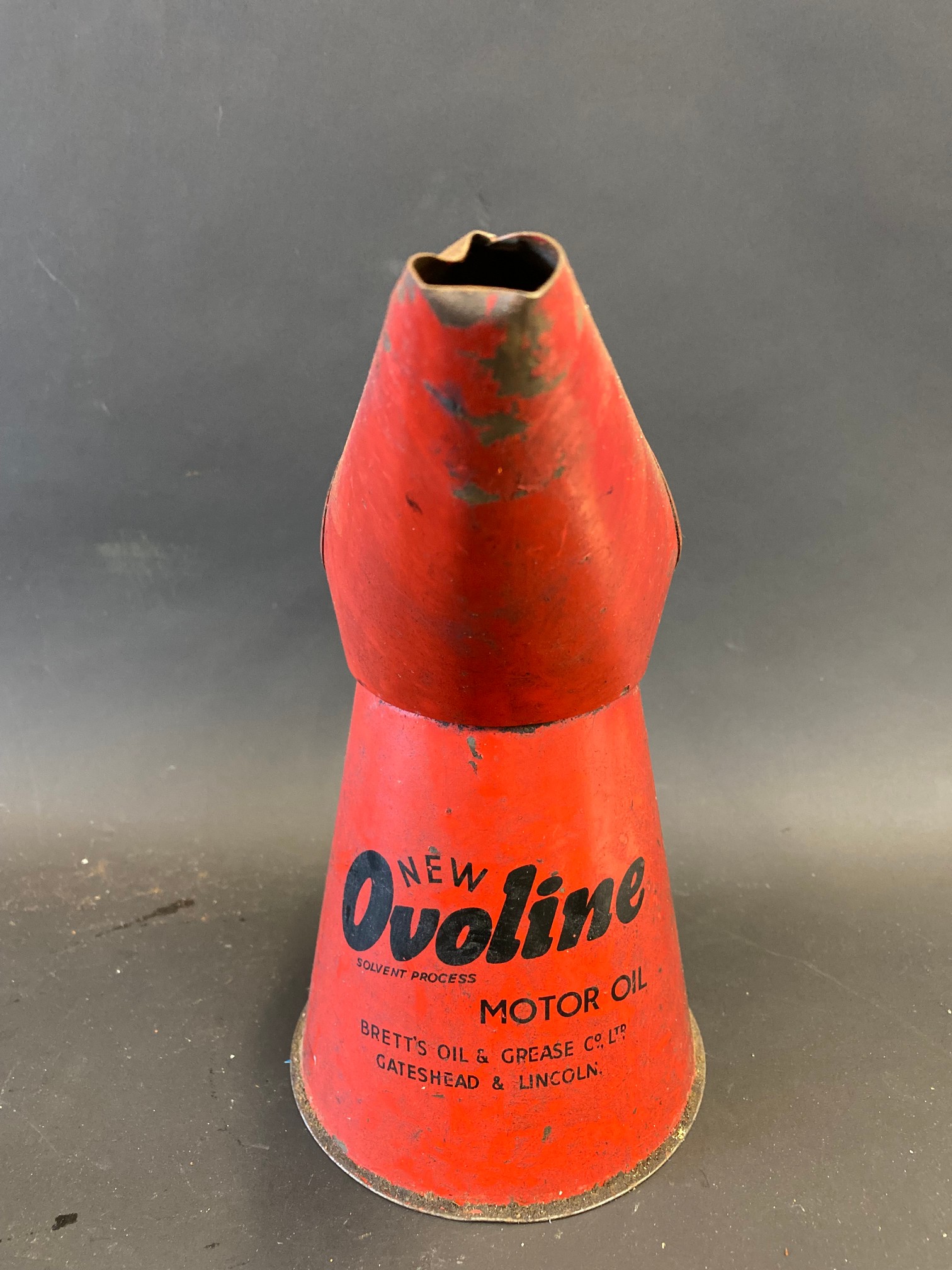 An Ovoline quart oil measure.