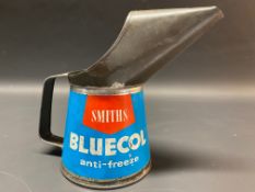 A Smiths Bluecol pint measure in good condition, dated 1962.