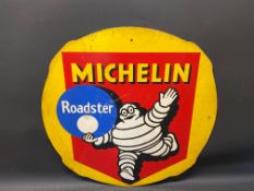 A Michelin Roadster hardboard advertising sign, 24 1/2" diameter.