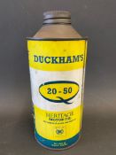 A Duckham's 20-50 Heritage Motor Oil cylindrical quart can.