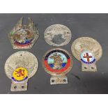 Five St. Christopher car badges, two with enamel location plaques for London and Scotland.