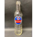 A Fina Motortonic glass quart oil bottle.