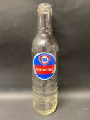 A Fina Motortonic glass quart oil bottle.