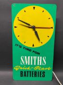 A Smiths Quick-Start Batteries wall clock, 9 x 16 1/2".