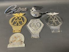 A tray of AA and other car badges, Desmo badge bar attachments etc.
