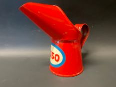 An Esso half pint oil measure, dated 1970, in excellent condition.