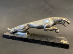 A Jaguar 'Leaper' accessory mascot, display base mounted.