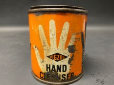 A Vigzol Hand Cleanser tin.