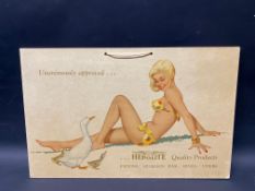 A Heppolite pictorial showcard depicting a recumbant lady in a bikini accompanied by a goose and her