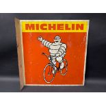 A Michelin aluminium pictorial double sided advertising enamel sign with hanging flange, depicting