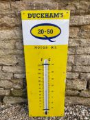 A Duckham's 20-50 Motor Oil enamel thermometer, 13 x 36".