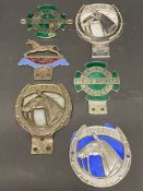 A quantity of car badges to include The King's Own Hussars etc.