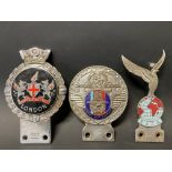 A Royal Air Force part enamel St. Christopher car badge, a Gaunt Regimental car badge and one other.