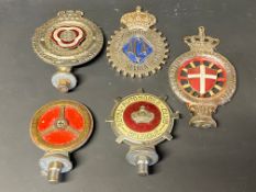 A Royal Automobile Club of Belgium car badge and four further Continental car badges.
