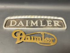 A Daimler commercial vehicle radiator name plate, 15 x 4 1/4" plus a Daimler brass cript badge.