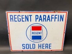 A Regent Paraffin Sold Here enamel sign with central globe motif, 18 x 14".