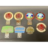 Eight assorted caravan and camping related car badges including The Camping Club of Great Britain