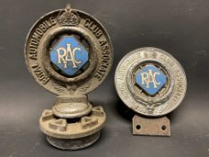 Two RAC Associate car badges with powder blue enamel centres.