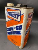 A Thrust 20W-50 Motor Oil gallon can.