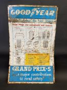 A Goodyear Grand Prix Tyres rectangular pictorial tin advertising sign, 20 x 32".