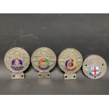 Four St. Christopher car badges, each with a regimental enamel disc including Royal Tank Regiment