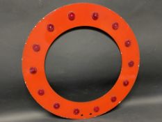 A reflective outer surround for a traffic order road sign, 18" diameter.