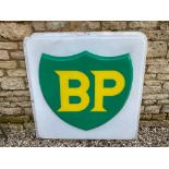 A large BP plastic illuminated lightbox panel, 44 1/2 x 44 1/2".