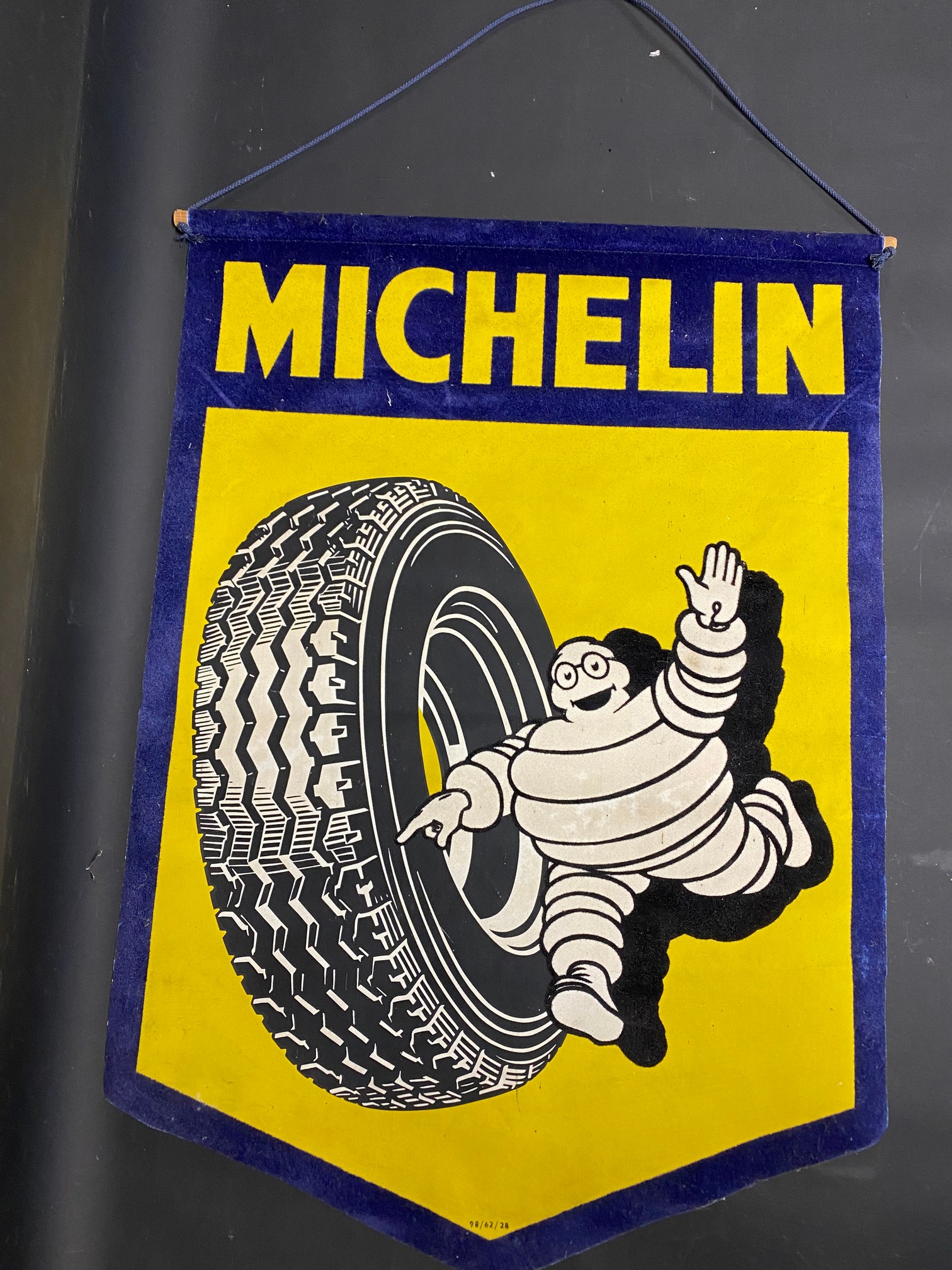 A Michelin felt hanging banner dated 1962, 17 1/4 x 24 1/4".