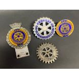 Four Rotary International badges including Gaunt.