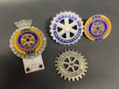 Four Rotary International badges including Gaunt.