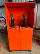 A large twin pump oil cabinet with curved up and over door, restored in Pratts colours.