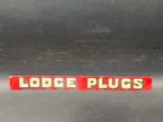 A Lodge Plugs shelf strip, in good condition.