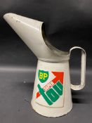 A BP Super Tou quart oil measure.