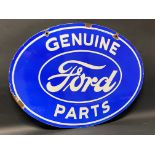 A Ford Genuine Parts oval double sided enamel sign stamped: Property of Ford Motor Co., made in USA,