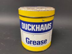 A Duckhams grease tin.