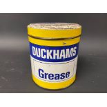 A Duckhams grease tin.